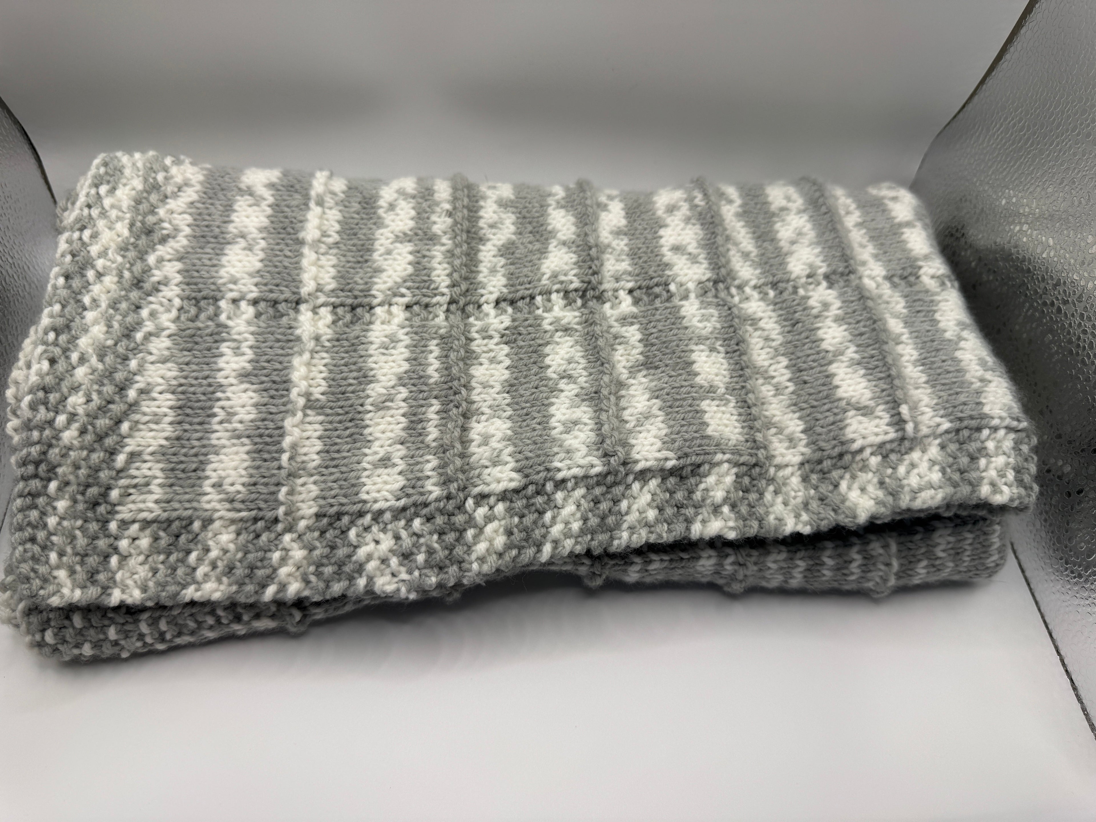 Grey and White Knitted Baby Blanket