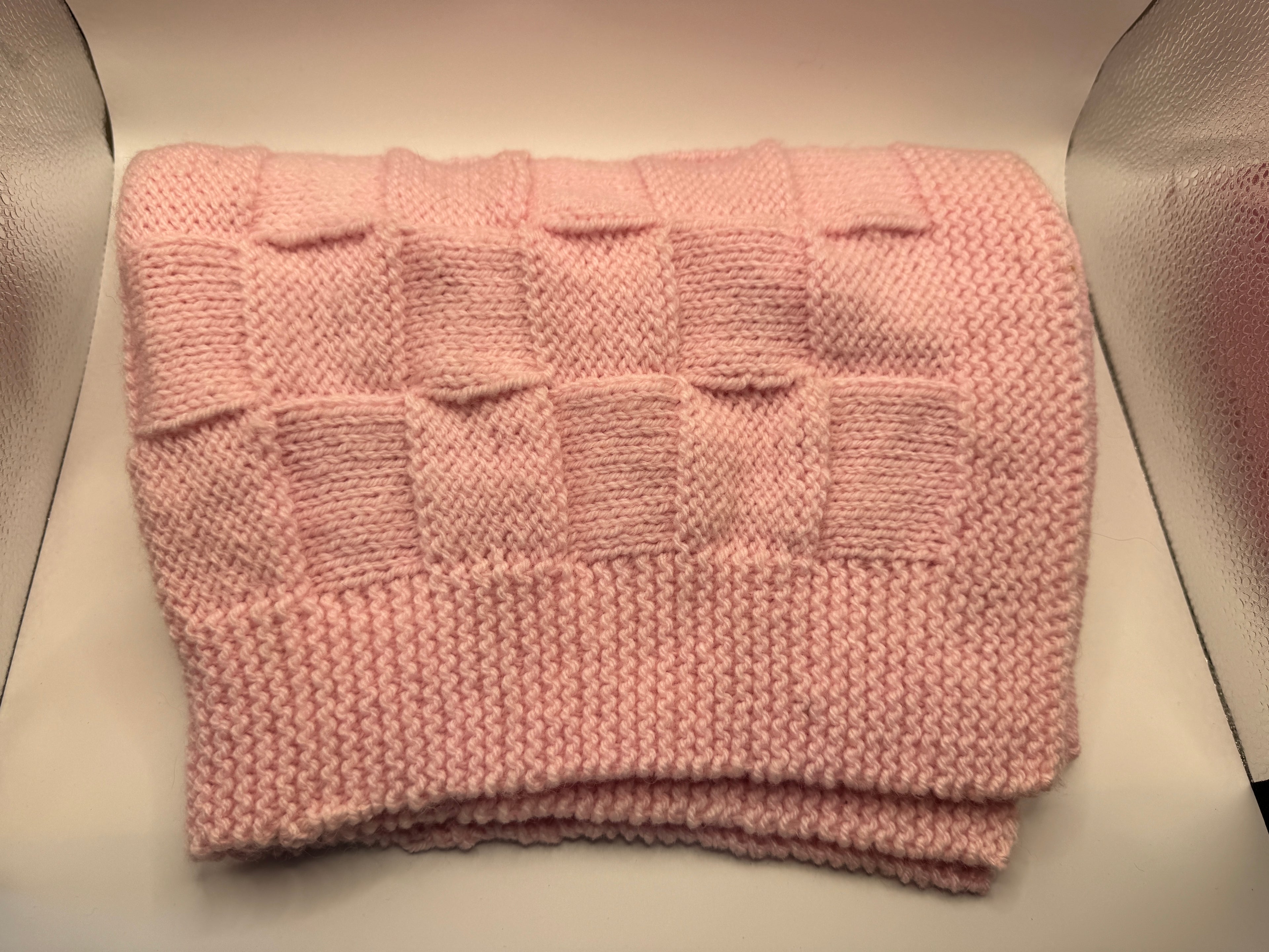 Pink knitted blanket