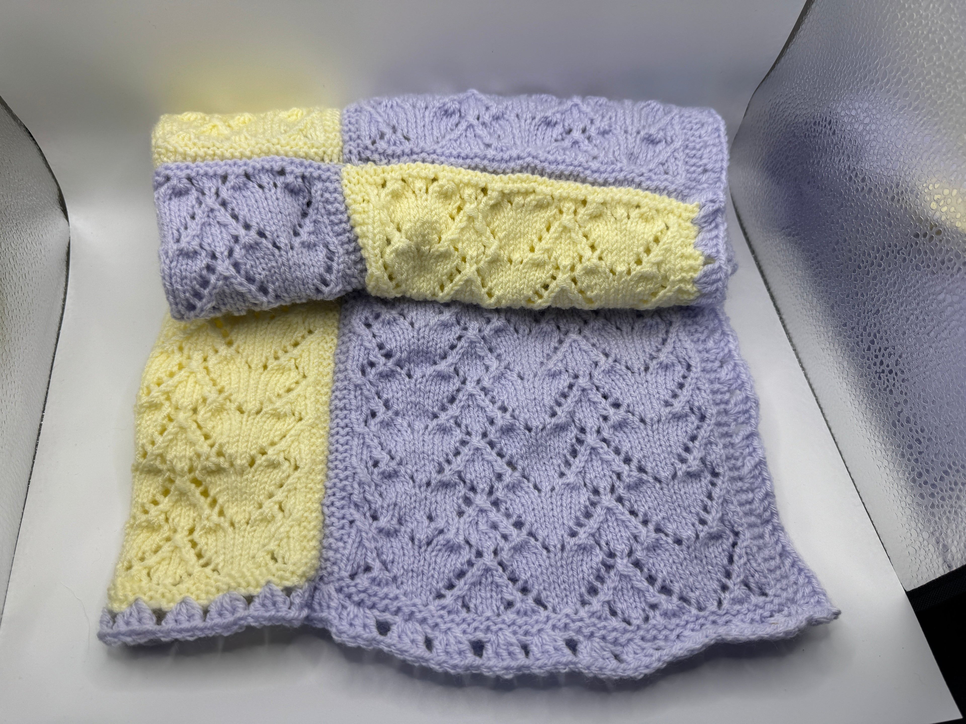 Yellow and Purple Knitted Blanket